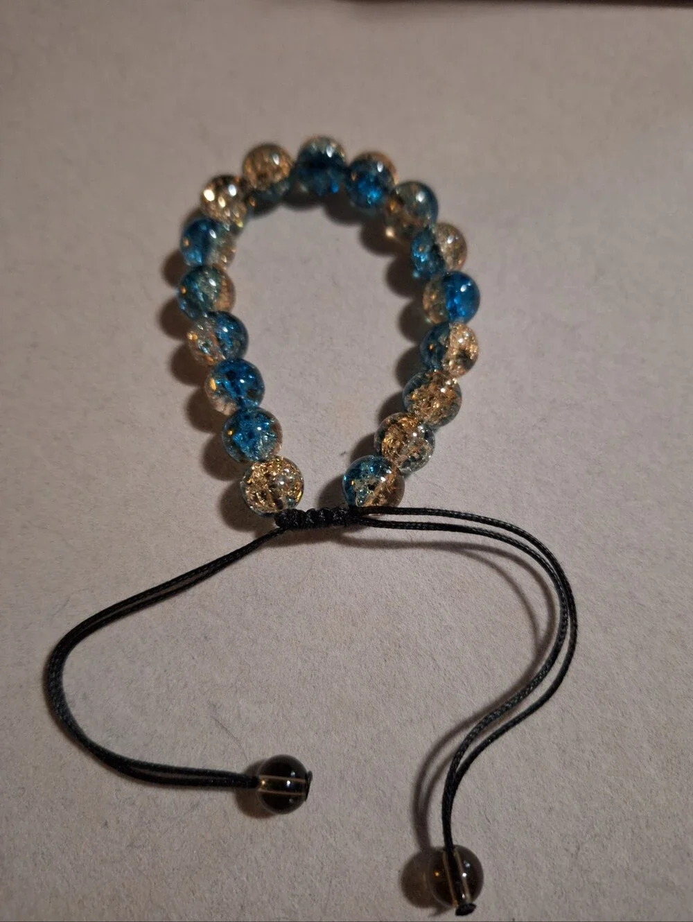 Adjustable Blue and Gold Beaded Bracelet